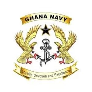 The official logo of the Ghana Navy features two golden eagles flanking a central anchor with a black star positioned above. Banners at the top and bottom display the name of the organization and its motto, 'Loyalty, Devotion and Excellence'.
