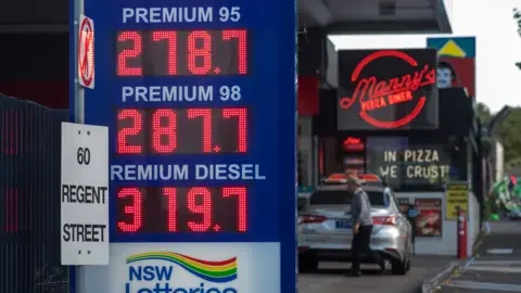 Getty Images Petrol prices displayed at a petrol station in Sydney, Australia