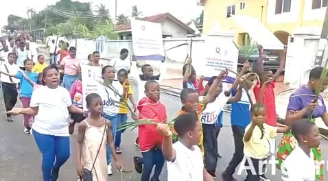 A cross-section of the children and youth from the Kaneshie Congregation of the Presbyterian Church of Ghana on their Hosanna procession