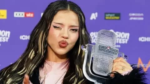 Getty Images Dara holds the Eurovision trophy