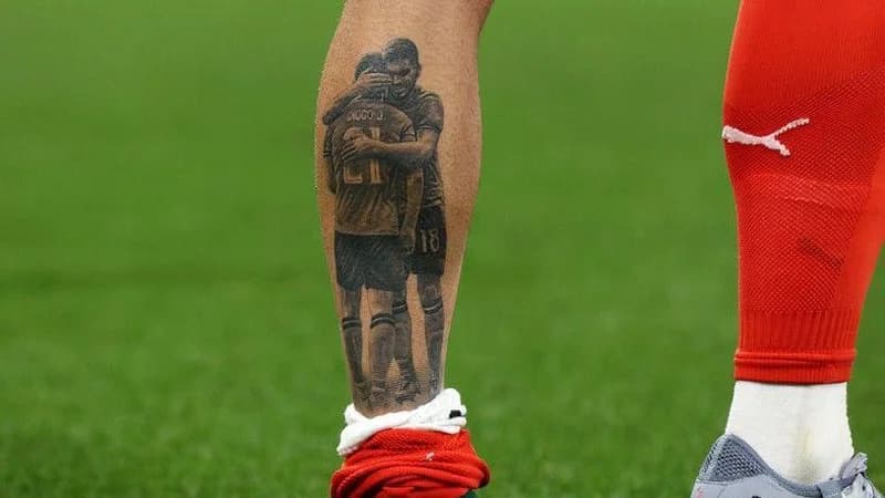 A tattoo on the calf of footballer Ruben Neves shows him embracing his former Porto, Wolves and Portugal team-mate Diogo Jota, who died in a car accident on 3 July, 2025