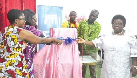 Professor Lydia Aziato (right), Vice-Chancellor of UHAS; Dr Sitsofe Gbogbo (left), Project Investigator, and other stakeholders unveiling the book of abstracts