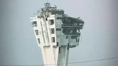 Instagram A large control tower is shown with windows blown out and the exterior crumbling