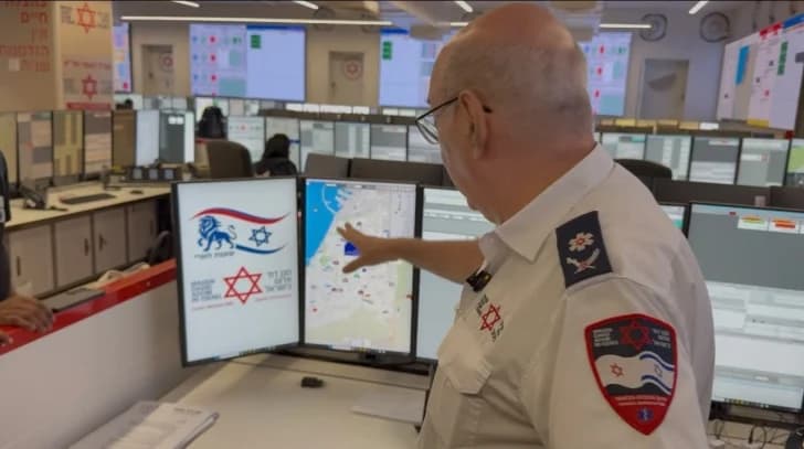 Chaim Rafalowski, Coordinator of International Cooperation at Magen David Adom, explaining how the ambulance service works in Israel
