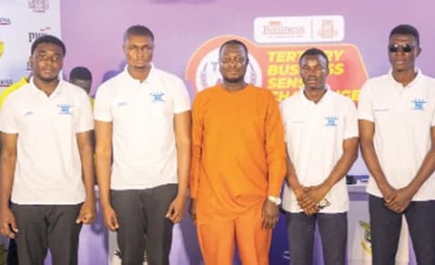 Alhassan Yusif Trawule (middle), Quizmaster of the Tertiary Business Sense Challenge, with the KNUST team after they were crowned winners of the North-Mid Zonal contest. Picture: CALEB VANDERPUYE