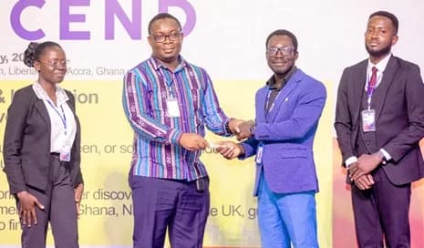 Tosin Adeoti (2nd from right), British Council, presenting the top prize honours to Dr Prince Odame, KNUST