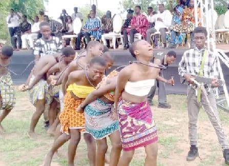 Pupils of ROVECA Preparatory school in the Kassena Nankana west District of the Upper East re-enacting the journey of slavery