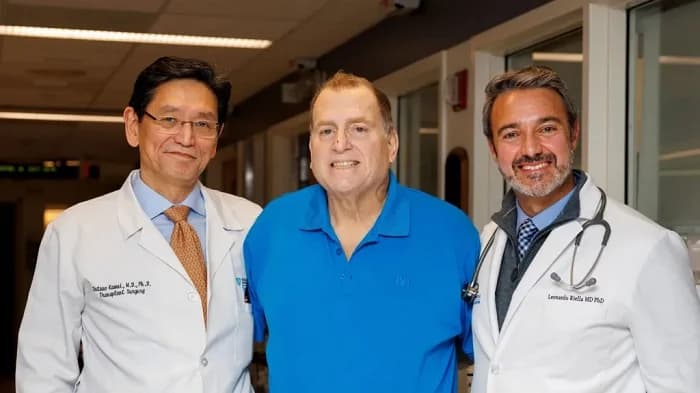 Patient Tim Andrews (centre) with Dr Tatsuo Kawai (left) and Dr Leonardo Riella (right)