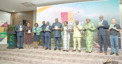 Elizabeth Ofosu-Adjare (5th from right), Minister of Trade, Agribusiness and Industry, being assisted by Simon Madjie (middle), CEO, GIPA; Dr Mary Awusi (3rd from right), CEO, Ghana Free Zones Authority; Francis Kojo Kwarteng Arthur (4th from right), CEO, Ghana Export Promotion Authority, and other officials to launch the 2026 Invest Ghana Summit and Ghana Club 100 Awards
