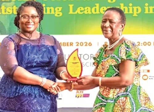 Dr Lucy Agyepong (left) receiving her award