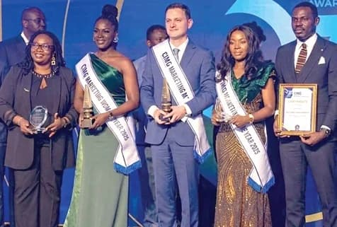Salem Kalmouni (3rd from left), Managing Director of Japan Motors, Abena Amoah (2nd from left), Managing Director of the Ghana Stock Exchange; and Thomasina Tettey (2nd from right), Import Sales Manager of MSC Mediterranean Shipping Company, displaying their awards. With them are some of the other award winners