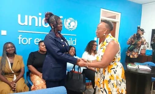 Anne Kariuki (right), Officer in Charge, UNICEF Ghana, welcoming Juliet Dede Gberbi, into her office to assume her role as the UNICEF Representative on the occasion of International Day of the Girl